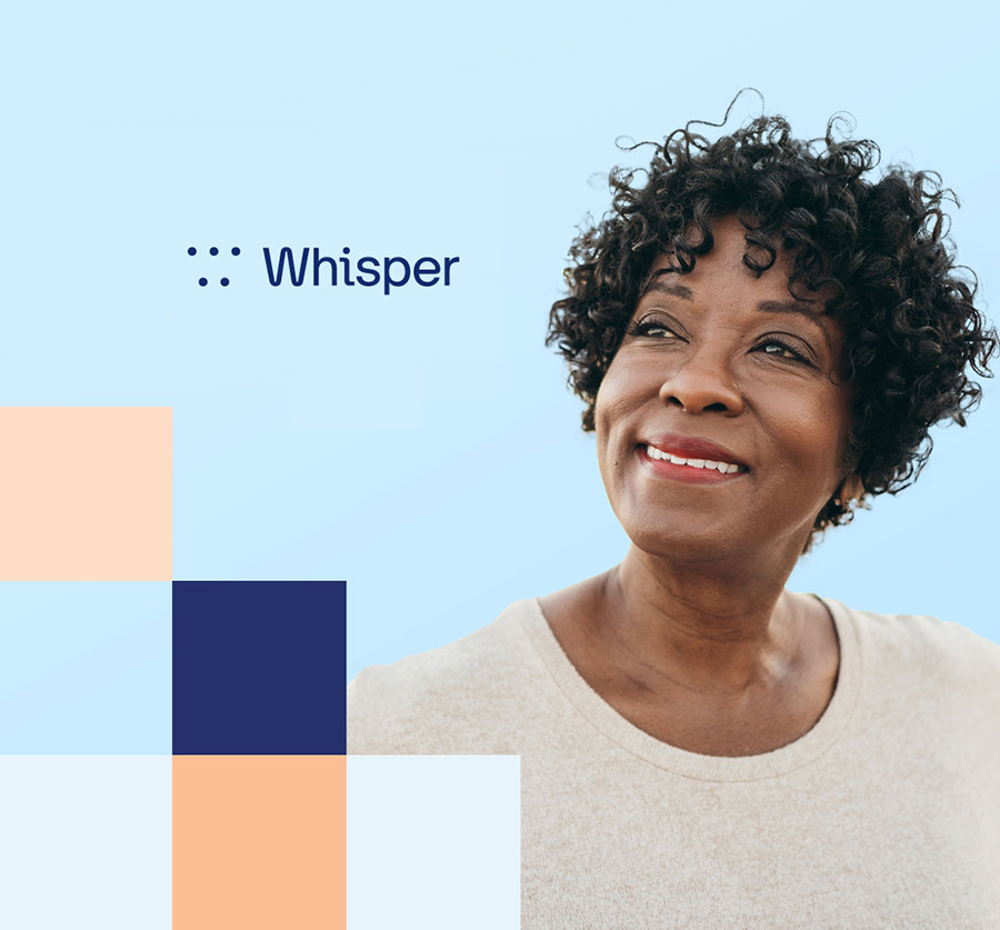 A woman wearing Whisper hearing aids